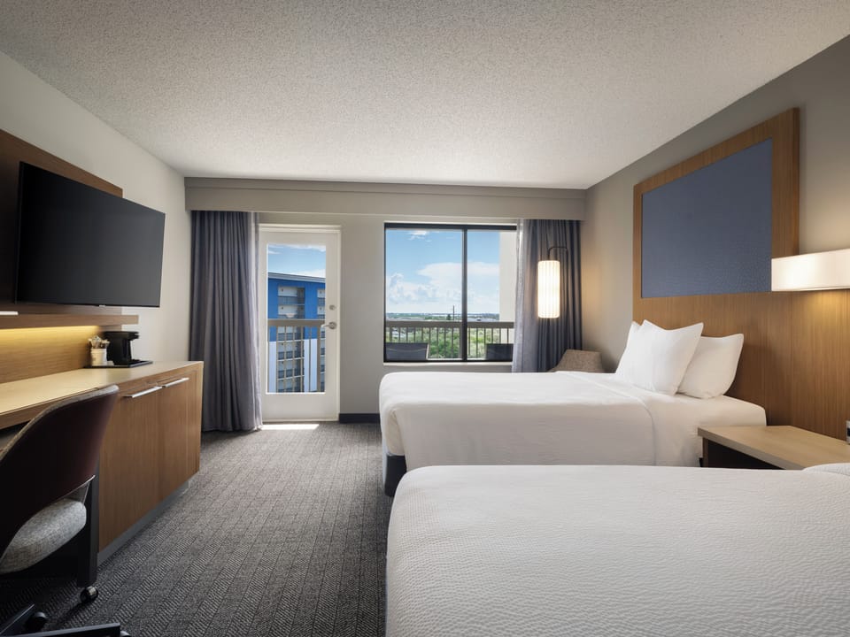 Room, 2 Queen Beds, Balcony (Mobility/Hearing Accessible, Tub) | In-room safe, desk, laptop workspace, blackout drapes