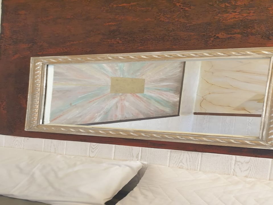 Room, 1 Bedroom, Balcony, Garden View | Living room | Books