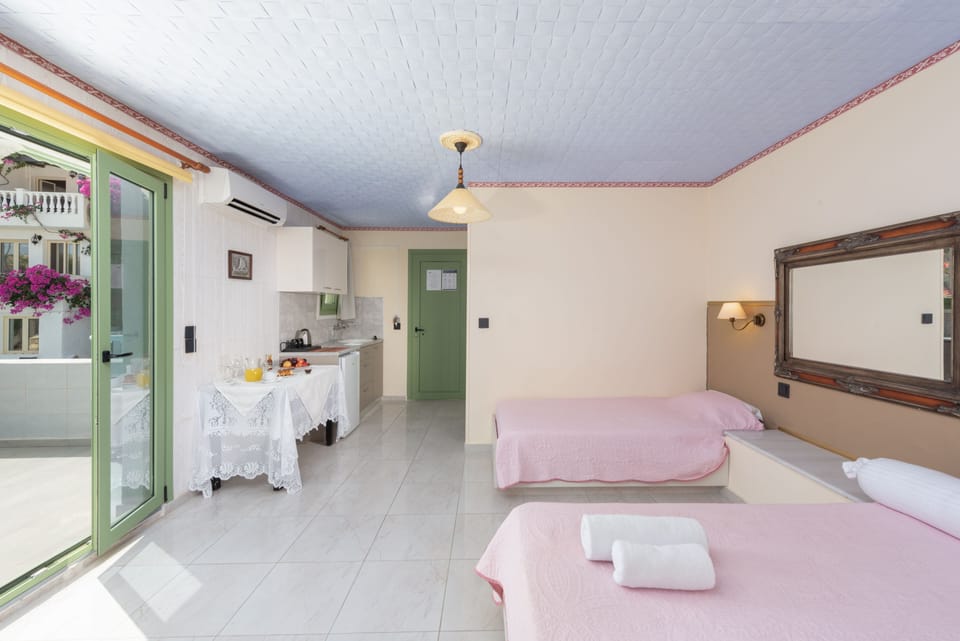 Room, 1 Bedroom, Balcony, Garden View | 2 bedrooms