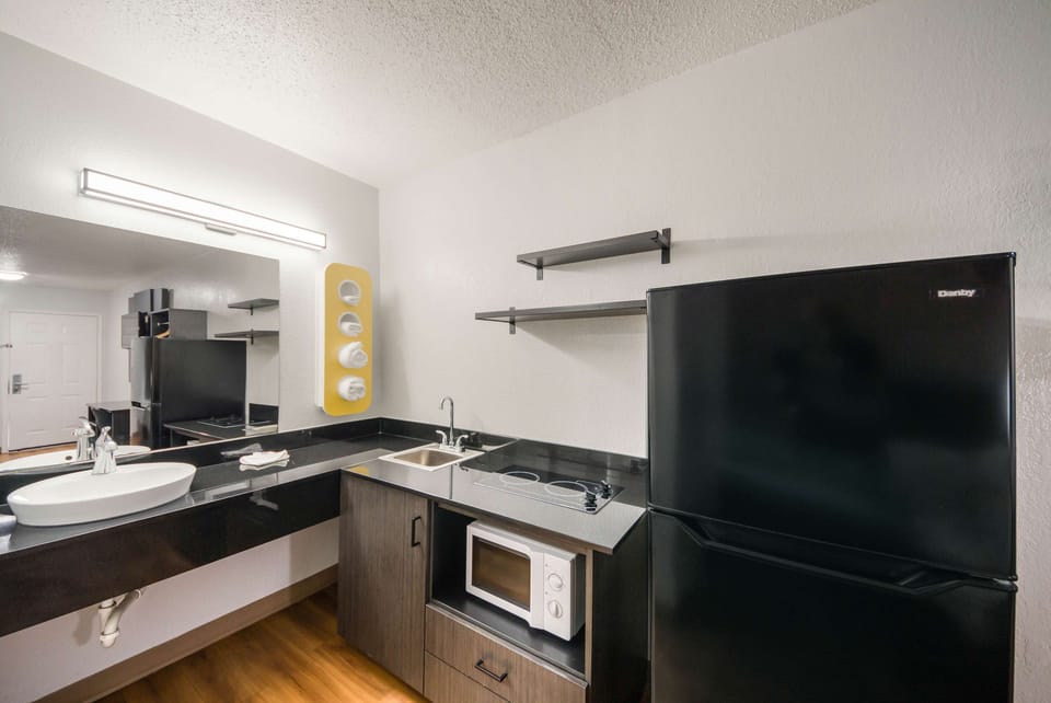 Full-size fridge, microwave, stovetop