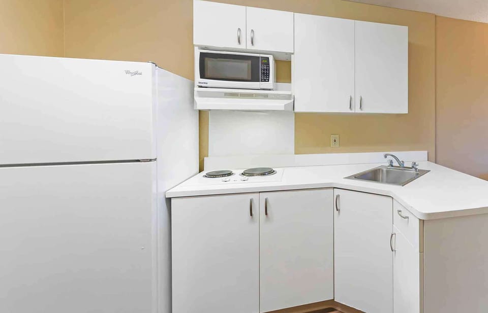 Studio, 1 King Bed, Non Smoking | Private kitchen | Full-size fridge, microwave, stovetop, coffee/tea maker