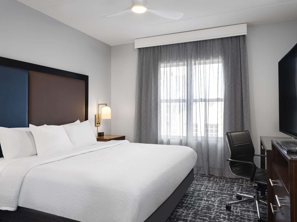 Down comforters, pillowtop beds, in-room safe, desk