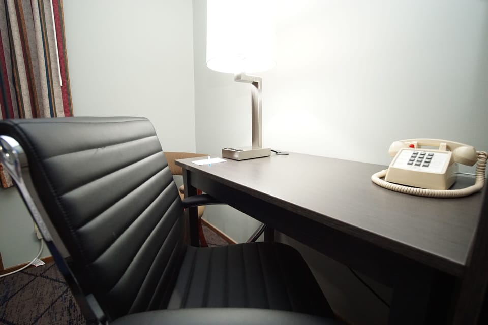 Individually furnished, desk, blackout drapes, iron/ironing board