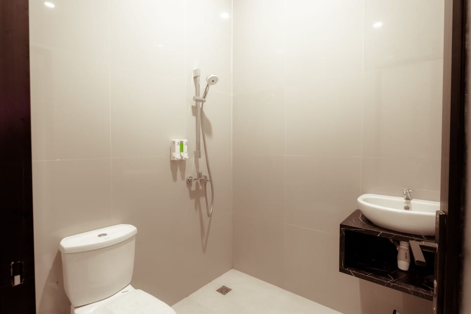 Shower, slippers, towels, soap
