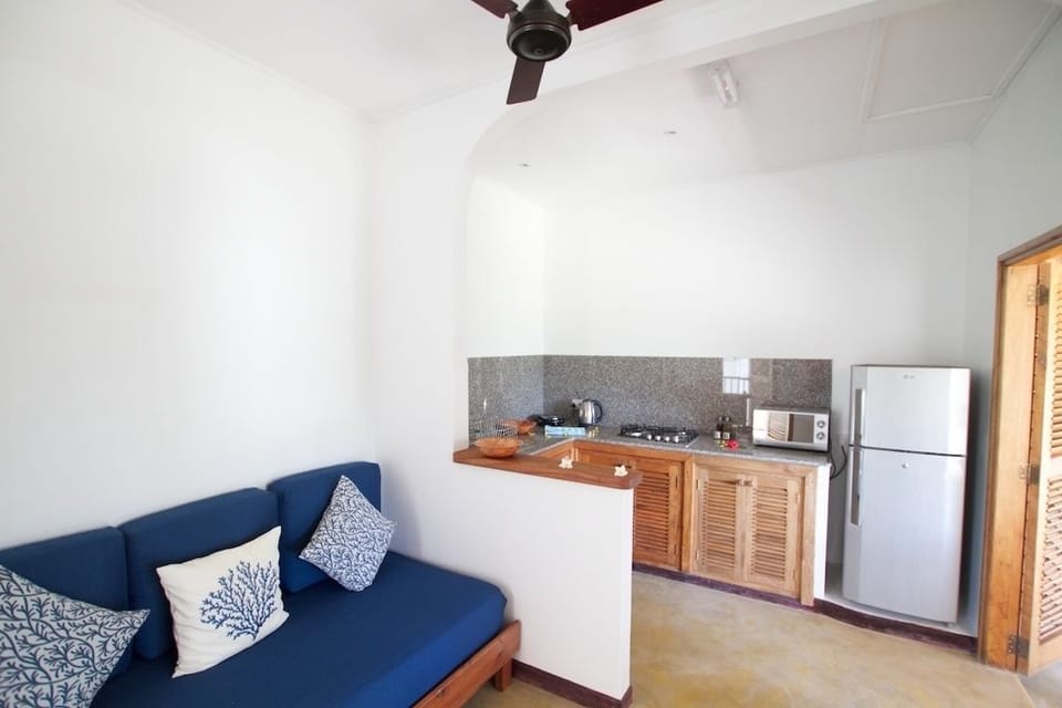 Apartment, Garden View | Living area | 24-inch LED TV with cable channels, TV