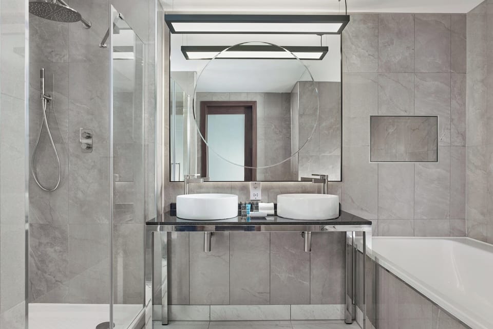 Suite, 1 Bedroom | Bathroom | Shower, rainfall showerhead, free toiletries, hair dryer