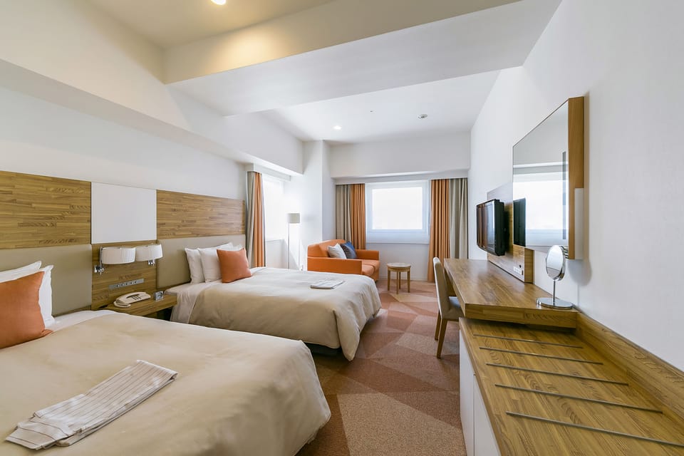 Deluxe Twin Room, Non Smoking | Desk, blackout drapes, soundproofing, iron/ironing board
