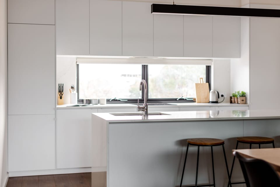 Three Bedroom Townhouse With Parking | Private kitchen | Full-size fridge, microwave, oven, stovetop