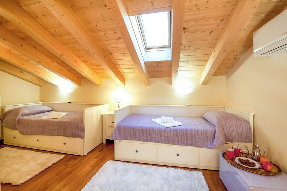 Family Apartment, Multiple Bedrooms, 2 Bathrooms, Mountainside (Tremezzo Ulivi Apt. 7) | 2 bedrooms, iron/ironing board, cribs/infant beds, WiFi