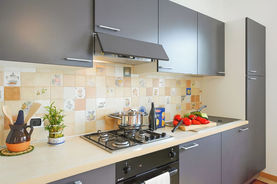 Family Villa, Multiple Bedrooms, 2 Bathrooms, Lakeside (Villa L'Approdo) | Private kitchen | Fridge, microwave, oven, stovetop