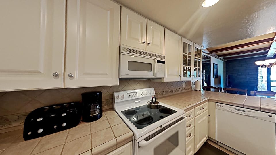 Condo, 2 Bedrooms | Private kitchen | Coffee/tea maker, fridge, oven, toaster