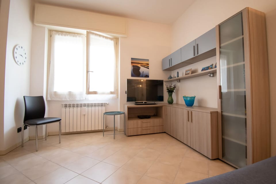 Apartment, 1 Bedroom | Living area | Flat-screen TV