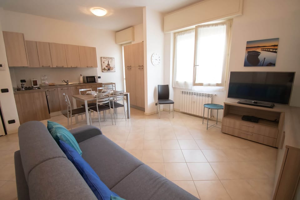 Apartment, 1 Bedroom | Living area | Flat-screen TV