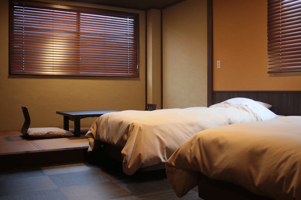 Quadruple Room, Non Smoking | In-room safe, WiFi (free), bed sheets
