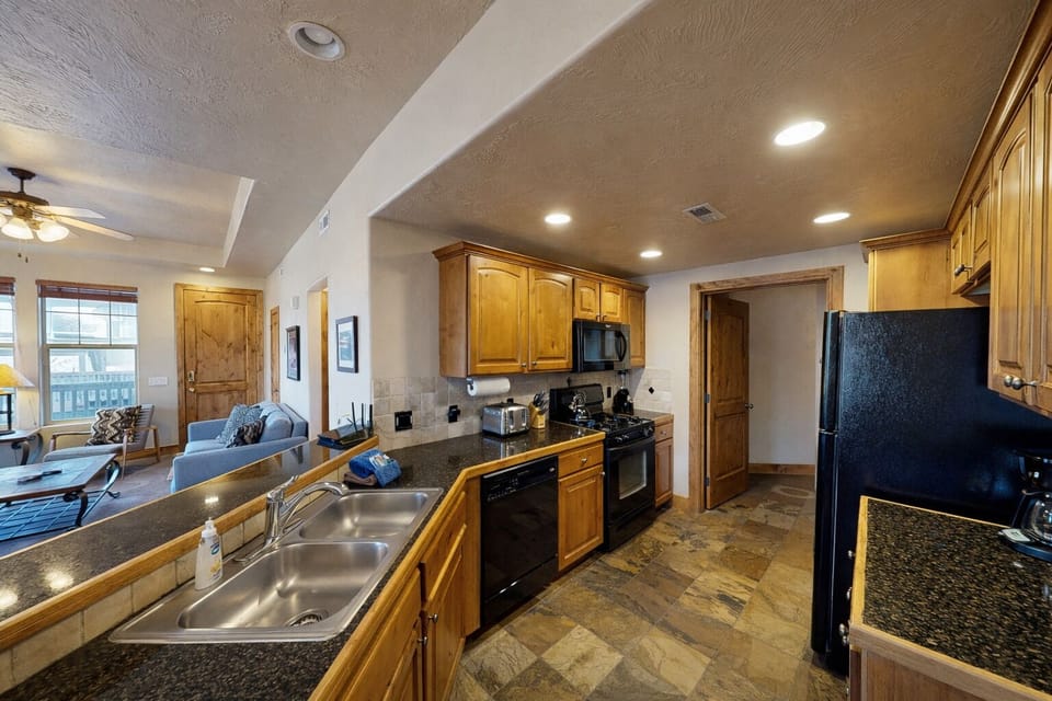 Condo, 2 Bedrooms | Private kitchen | Fridge, microwave, oven, coffee/tea maker
