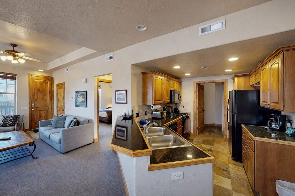 Condo, 2 Bedrooms | Private kitchen | Fridge, microwave, oven, coffee/tea maker