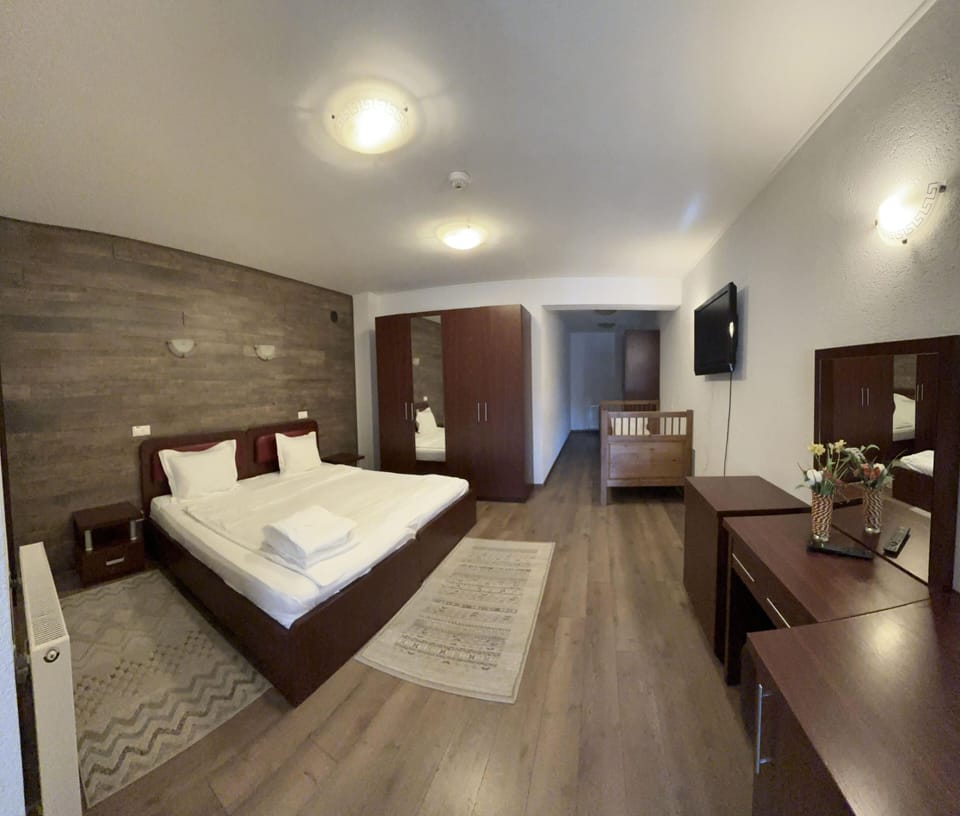 Family Room | Premium bedding, individually decorated, individually furnished, desk