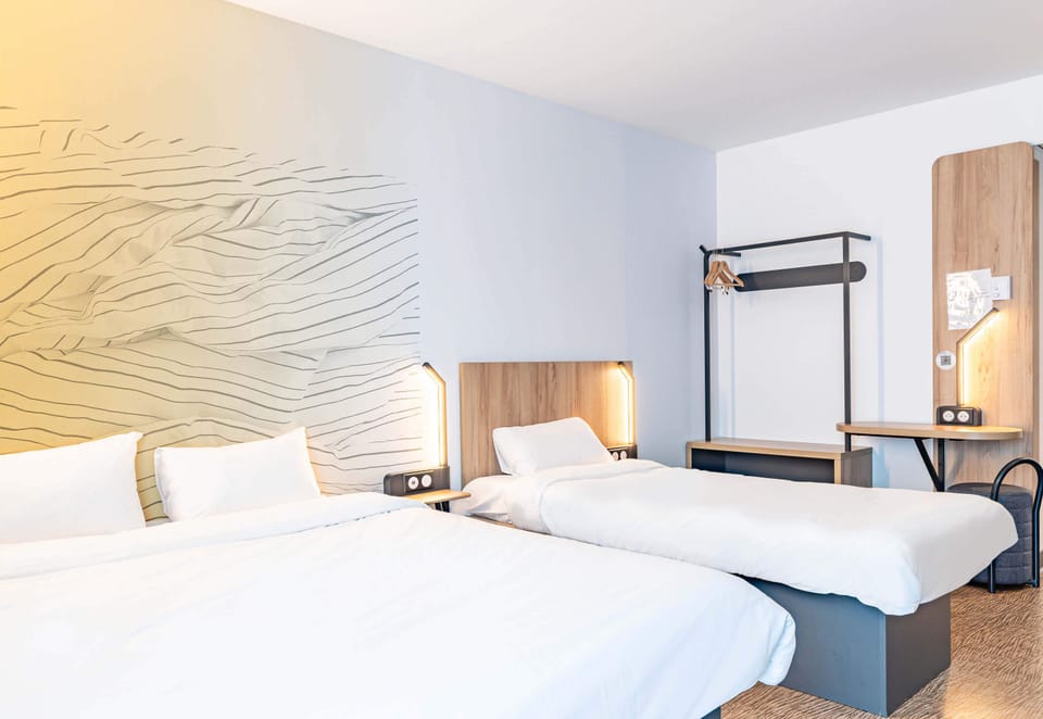 Triple Room | Desk, soundproofing, iron/ironing board, free cribs/infant beds