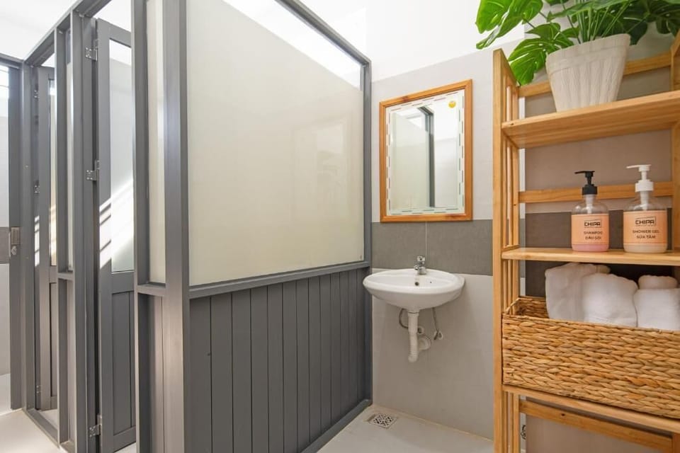 Shower, free toiletries, hair dryer, slippers