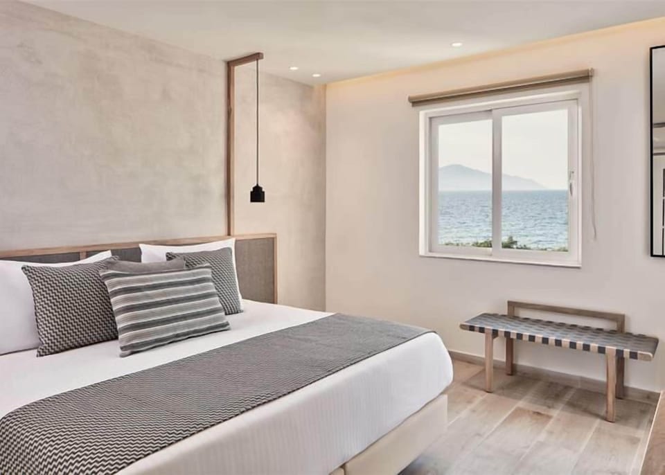 Family Suite, Sea View | In-room safe, desk, free WiFi, bed sheets