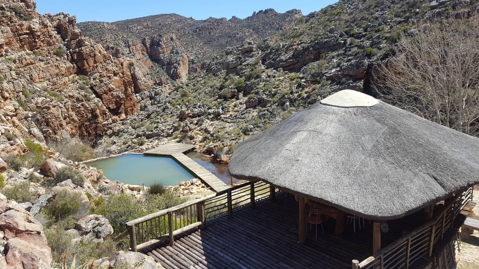 2 outdoor pools, a natural pool, pool umbrellas, sun loungers