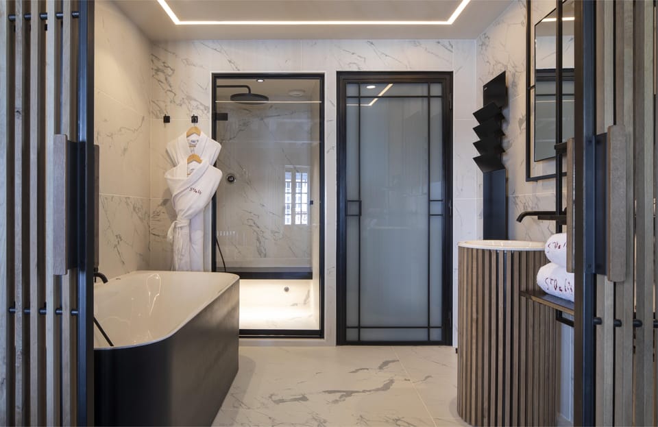 Deluxe Double Room | Bathroom | Designer toiletries, hair dryer, bathrobes, slippers