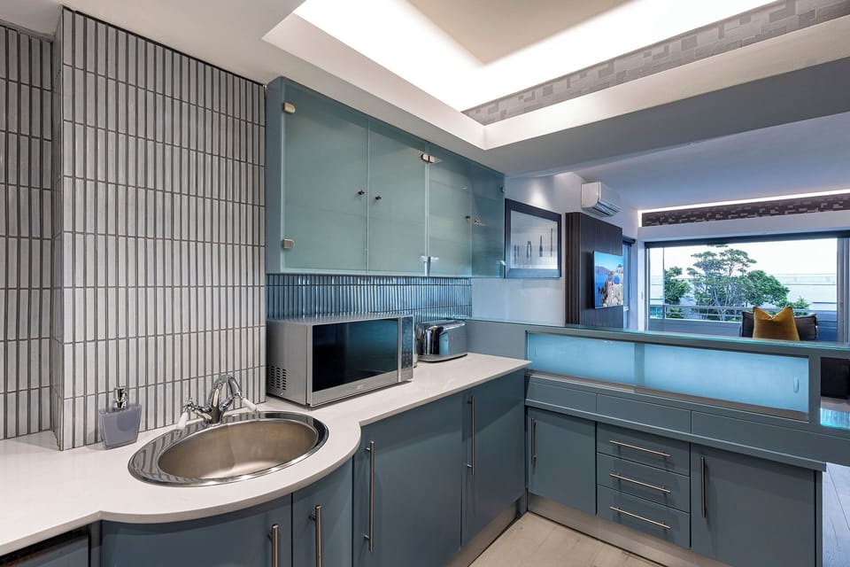 Clifton YOLO Spaces - Clifton Beachfront Executive | Private kitchen | Full-size fridge, microwave, oven, stovetop