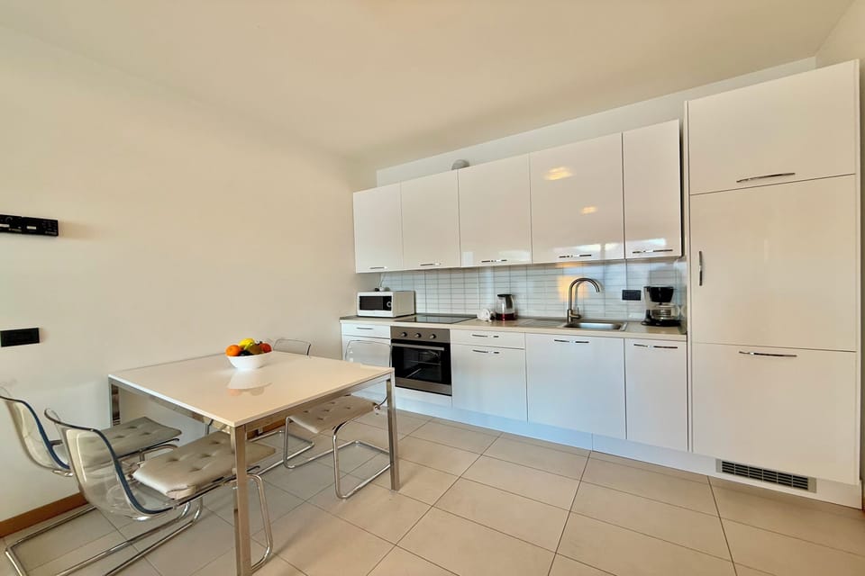 Family Apartment, Multiple Bedrooms, Mountainside (Residence degli Oleandri 4B) | Private kitchen | Full-size fridge, microwave, oven, stovetop