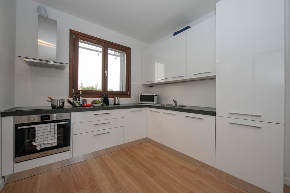 Family Apartment, Multiple Bedrooms, Mountainside (Argegno Home) | Private kitchen | Full-size fridge, microwave, oven, stovetop
