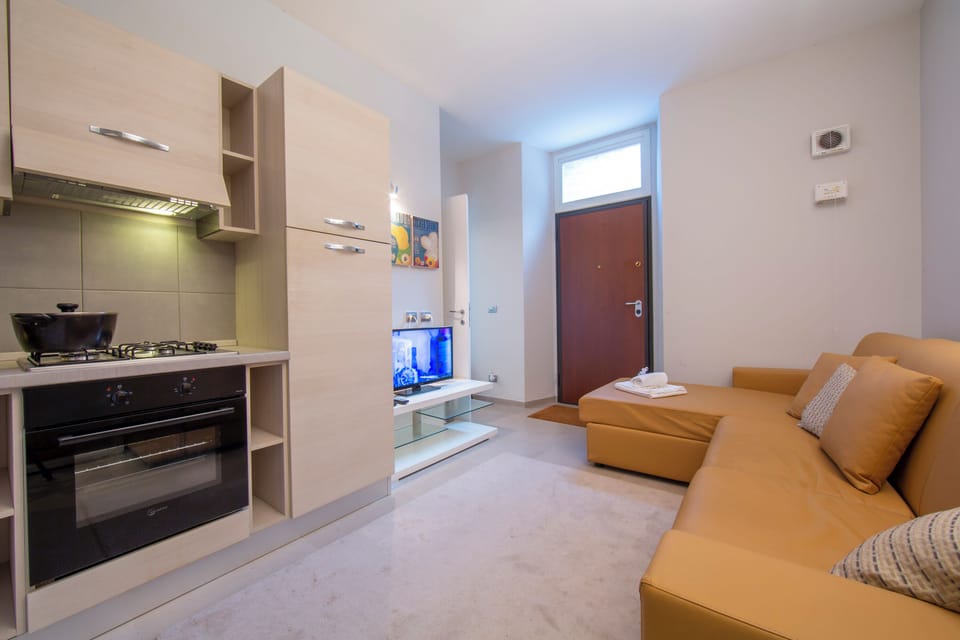 Family Villa, Multiple Bedrooms (Villa Lucia Laglio) | Living area | 21-inch flat-screen TV with digital channels, TV, stereo