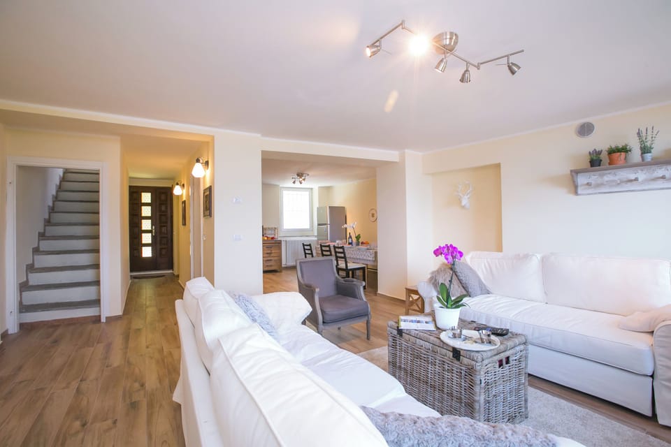 Family Townhome, Multiple Bedrooms, Mountainside (Plesio Rustico Panoramica) | Living area | Flat-screen TV