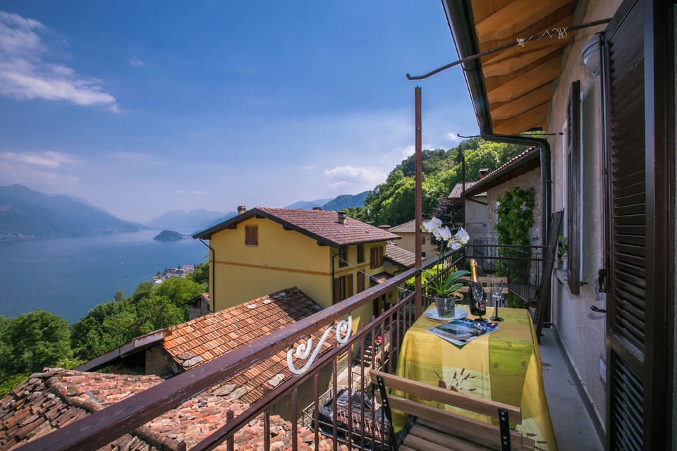 Family Townhome, 3 Bedrooms, Balcony, Mountainside (Plesio Rustico Panoramica) | Outdoor dining