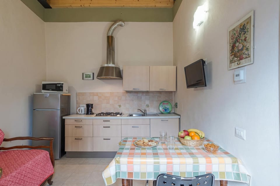 Family Apartment, Multiple Bedrooms, Lakeside (Casetta al Lago) | Private kitchen | Fridge, microwave, stovetop, dishwasher