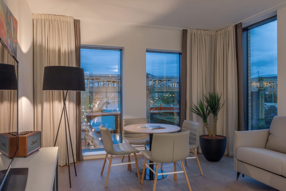 Premium bedding, down comforters, minibar, in-room safe