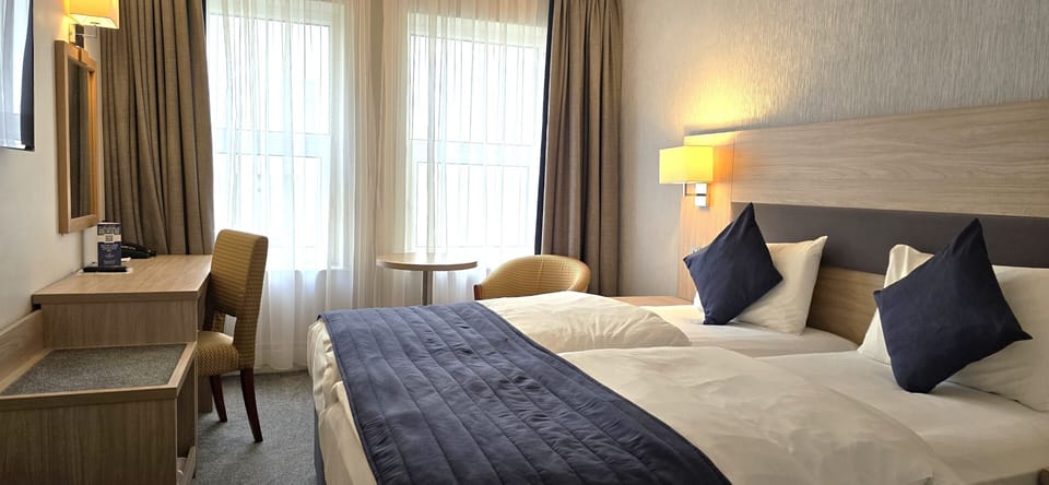 Classic Twin Room | Desk, blackout drapes, iron/ironing board, free WiFi