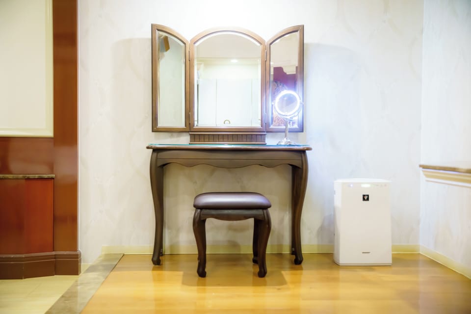 Standard Room, 1 King Bed (Couples Hotel) | Desk, blackout drapes, soundproofing, iron/ironing board (on request)