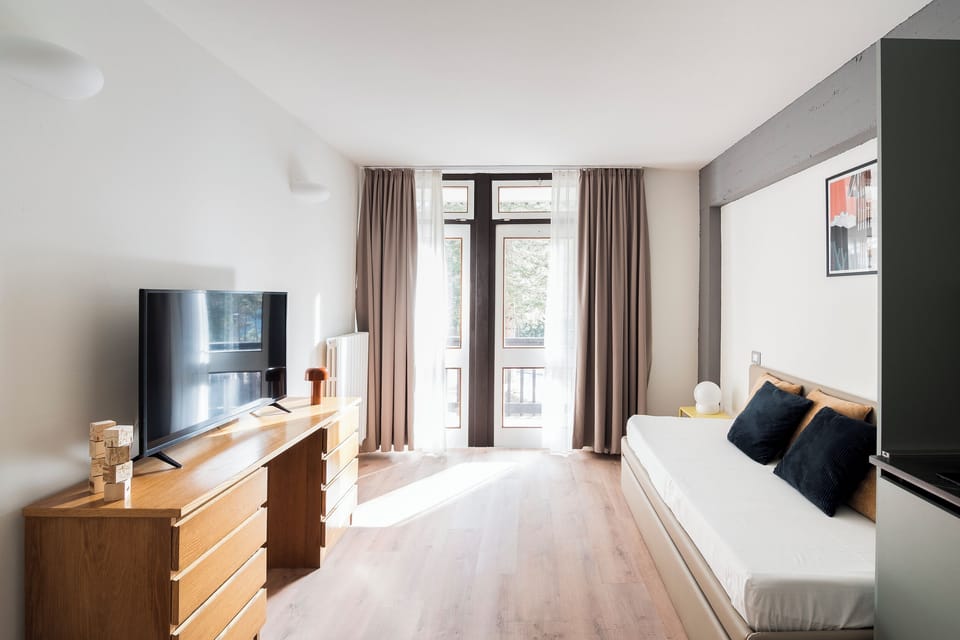 40-inch flat-screen TV with satellite channels, TV