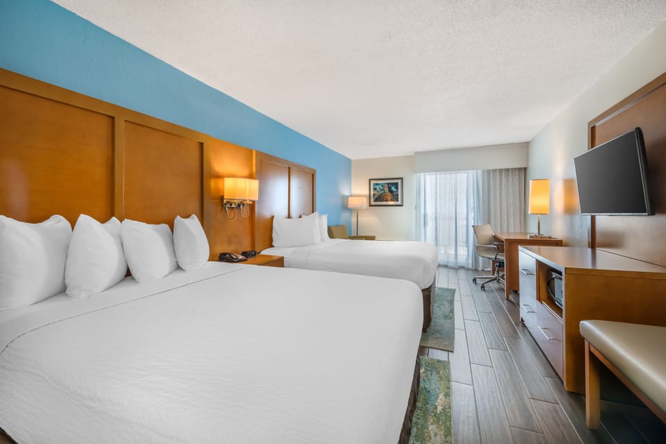 Deluxe Room, 2 Queen Beds, Balcony, Oceanfront | Premium bedding, in-room safe, blackout drapes, iron/ironing board