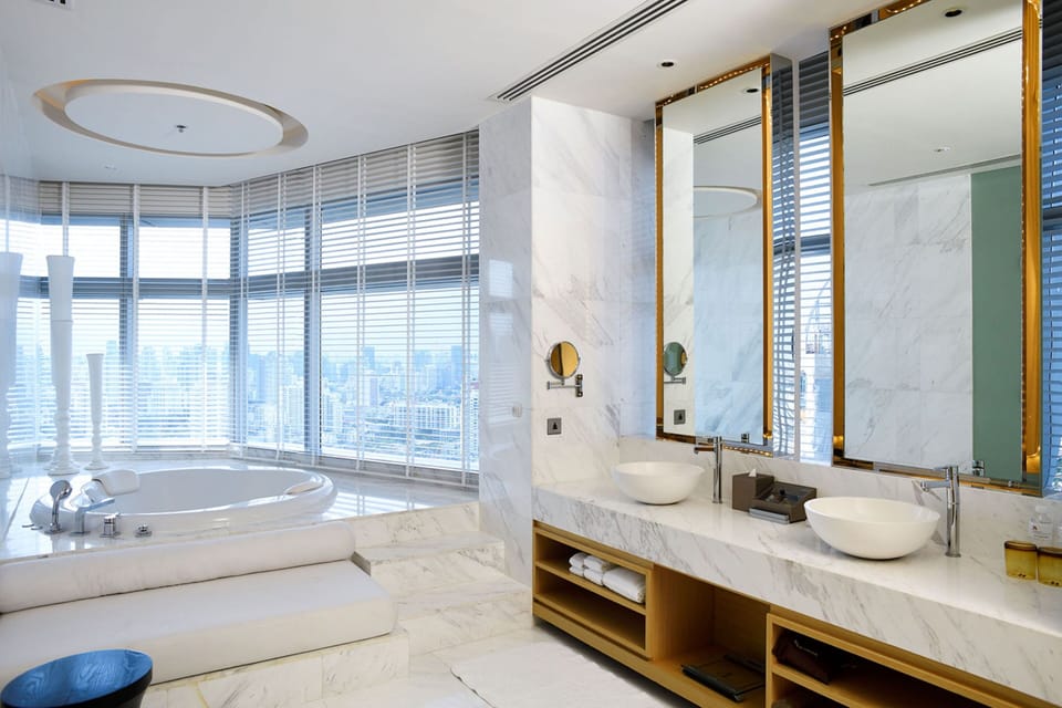 Presidential Suite, 2 Bedrooms | Bathroom | Separate tub and shower, hydromassage showerhead, designer toiletries