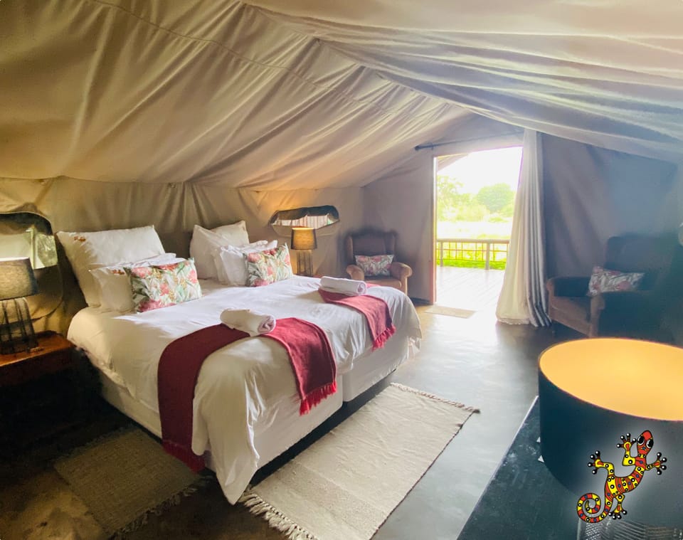 Luxury Tent, Ensuite, River View | In-room safe, desk, blackout drapes, iron/ironing board (on request)