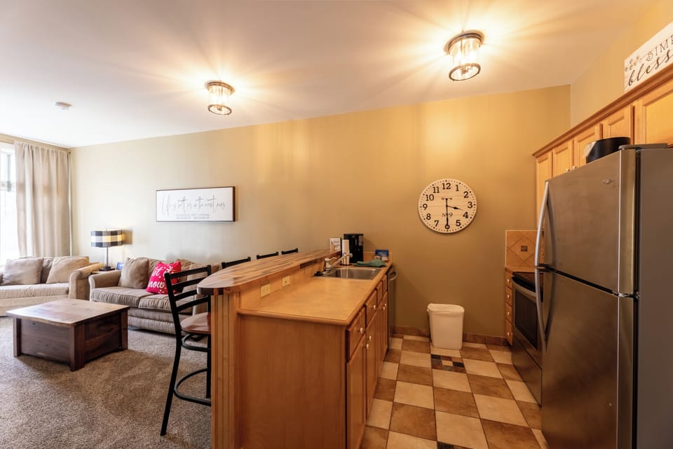 Classic Condo | Private kitchen | Coffee/tea maker, microwave, stovetop, cookware/dishes/utensils