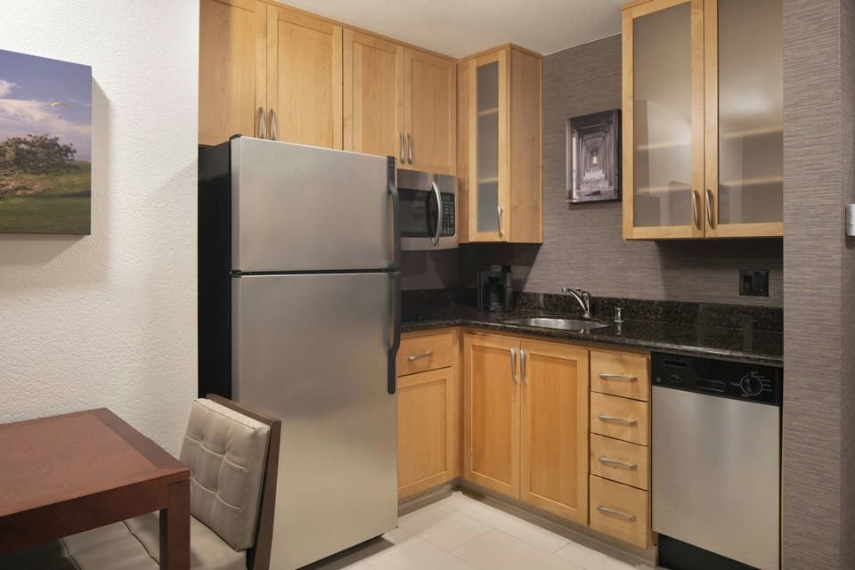 Studio, 1 King Bed with Sofa bed | Private kitchen | Full-size fridge, microwave, stovetop, dishwasher