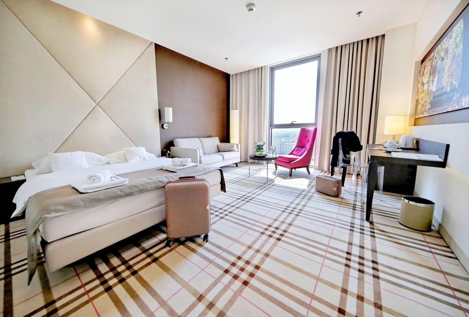 Standard Double or Twin Room | Living area | 32-inch flat-screen TV with satellite channels, TV