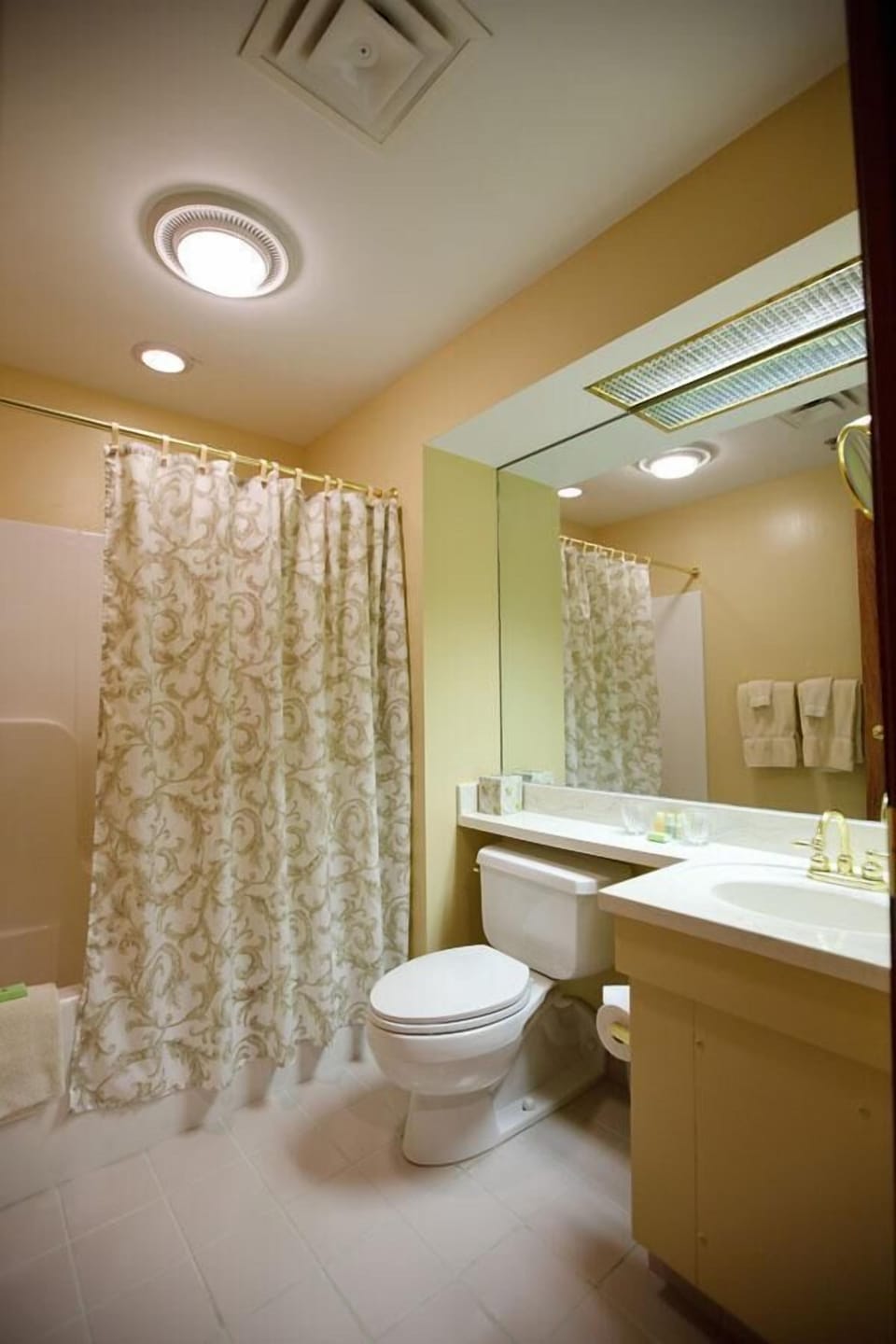 Combined shower/tub, hair dryer, towels, soap