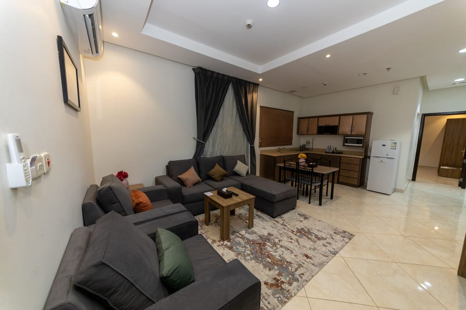 Deluxe Apartment, 2 Bedrooms | Living area | LCD TV