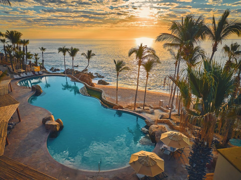 6 outdoor pools, cabanas (surcharge), pool umbrellas