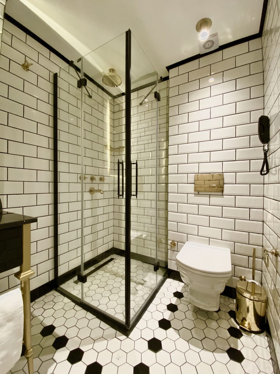 Shower, bathrobes, slippers, towels