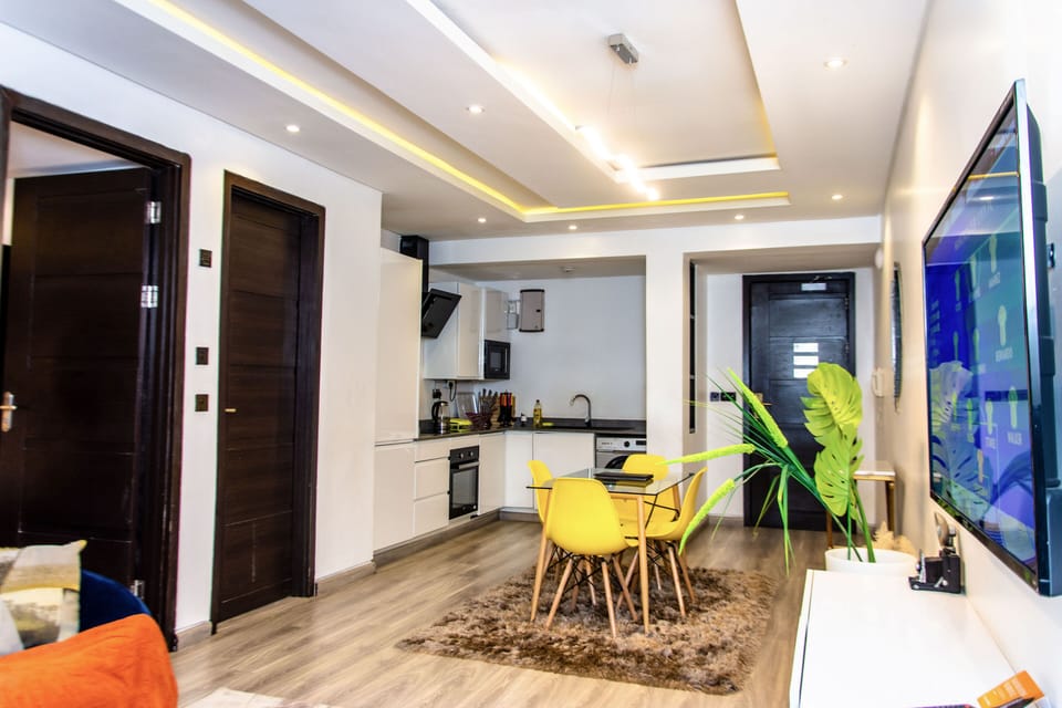 Executive Apartment, 1 Bedroom, Pool Access | Living area | 50-inch Smart TV with cable channels, Netflix, streaming services