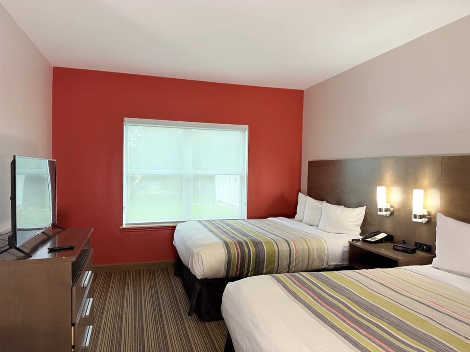 Suite, Multiple Beds, Non Smoking | Premium bedding, desk, blackout drapes, iron/ironing board