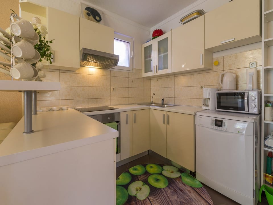 Villa | Private kitchen | Fridge, microwave, oven, stovetop